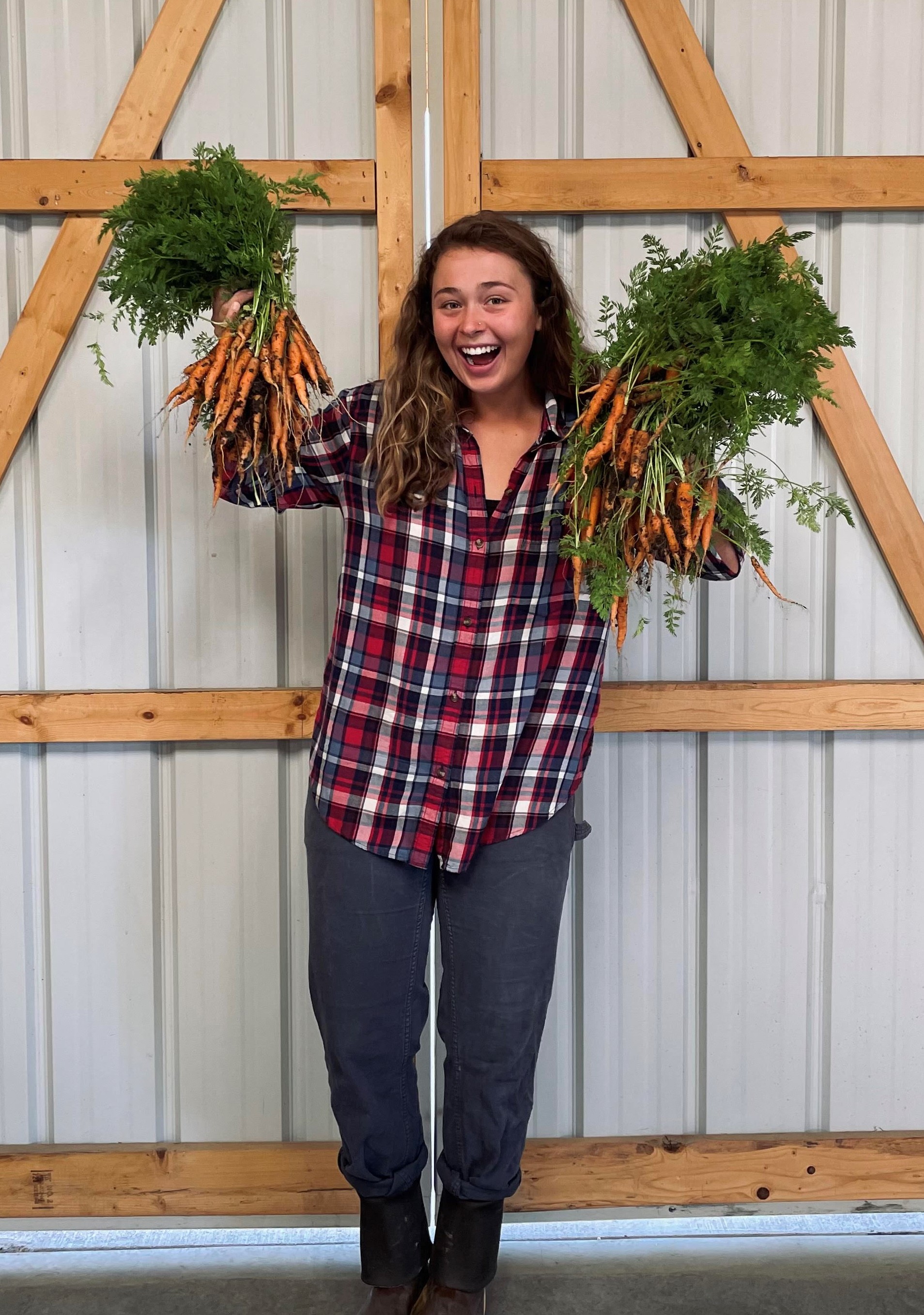 Hailie Richardson holding carrots